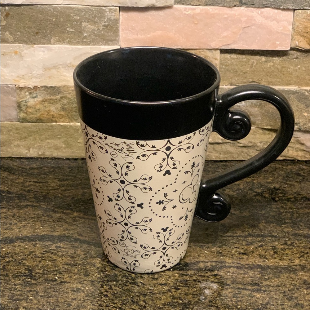 DISNEY PARKS | Tall Black and White Discontinued Hidden Mickey Mug.
